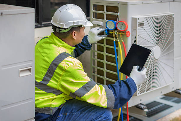 Professional Air Conditioning Repair technician working in Rives Junction, MI